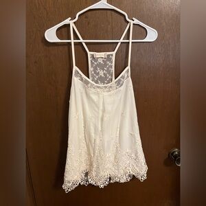 White lacy tank top from Altar’d State